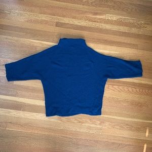 The Reset ocean blue turtleneck cropped sweater